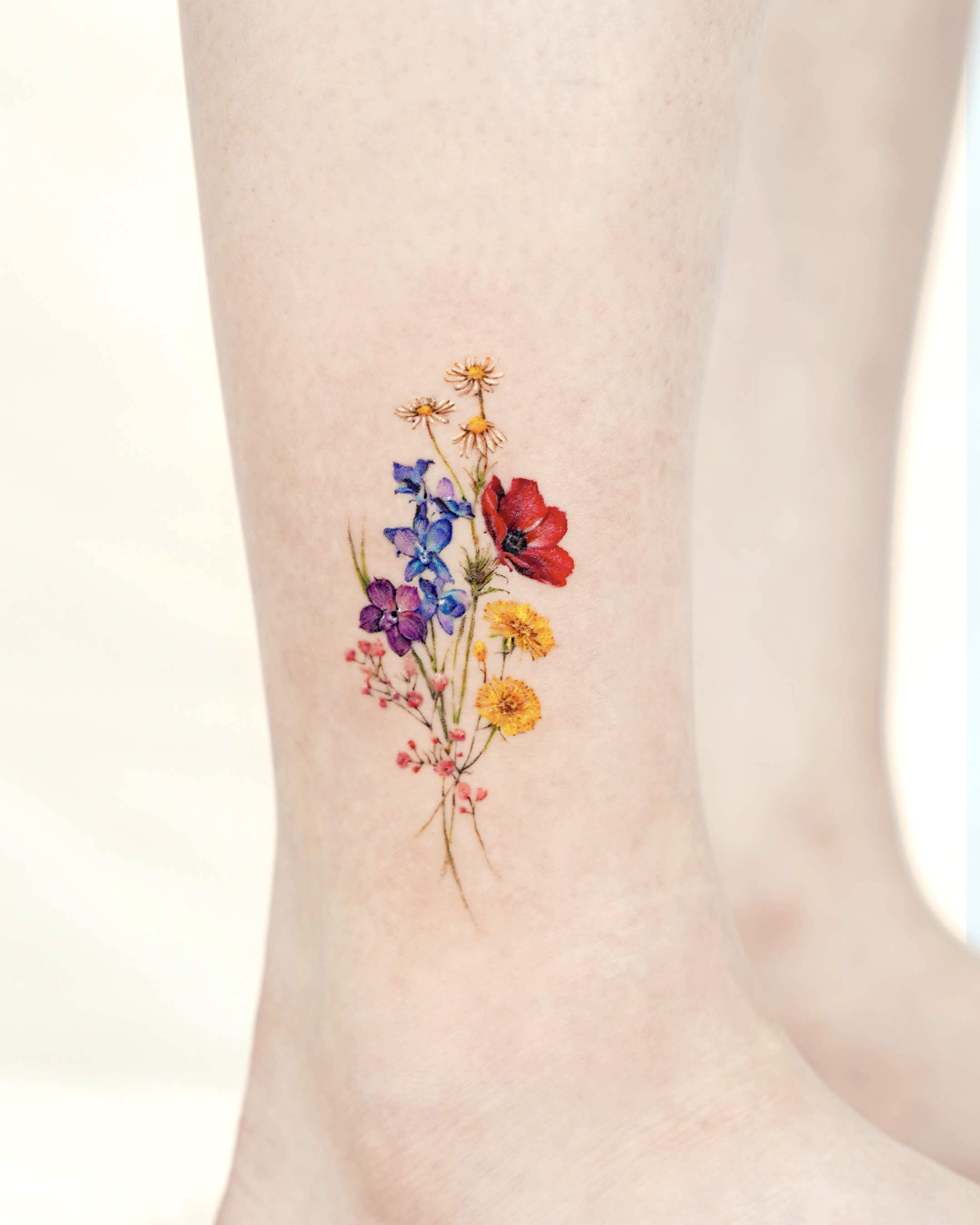 Floral anklet tattoo | Wrap around wrist tattoos, Wrap around ankle tattoos,  Wrap around tattoo