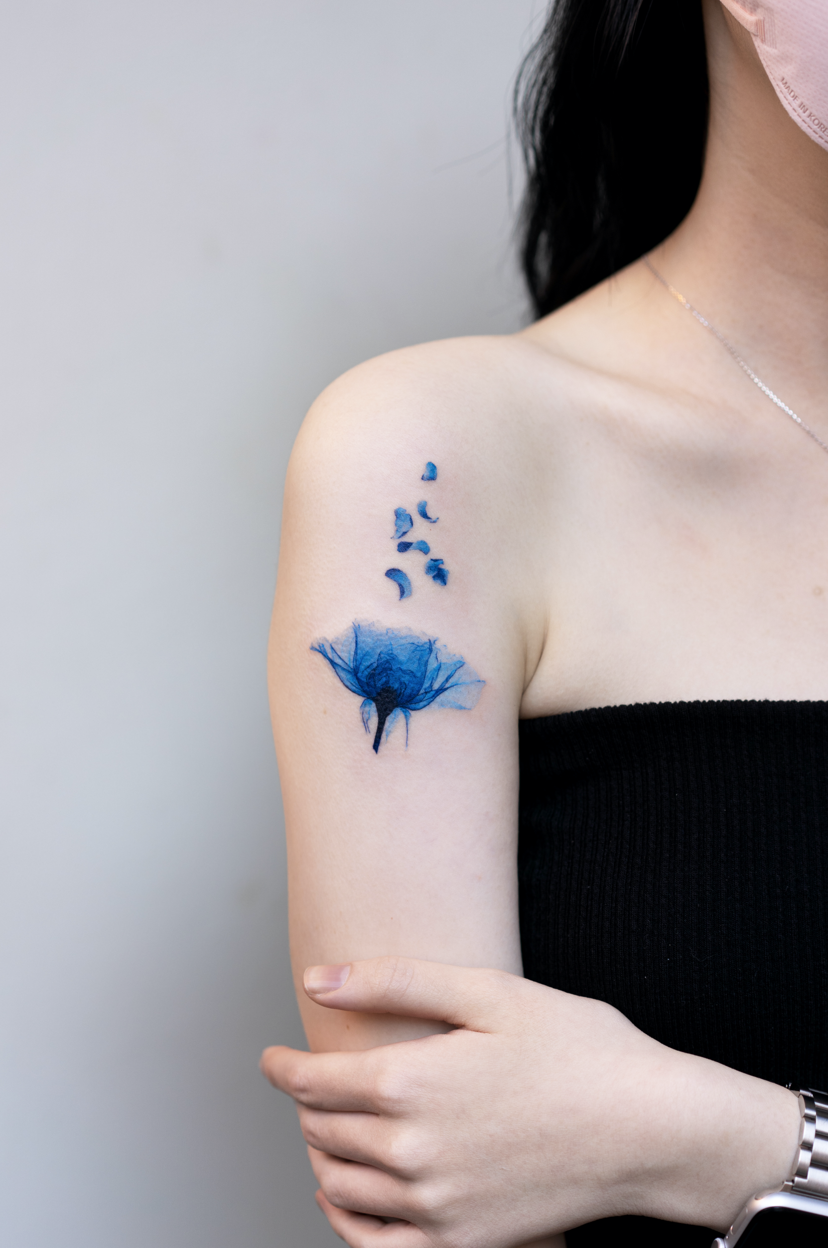 Ethereal Tattoo Designs Are Colored in Blue Ink
